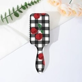 Detail of cherry plaid hairbrush showing the printed handle and storage hanging hole - Black and White Plaid Style (E)