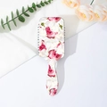 Detailansicht der Haarbürste mit Blumenmuster, Massageborsten und Aufhängeloch - Rosa Rosen-Druck (C)