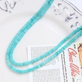Detail of teal natural agate beads on white decorative tray with card for DIY jewelry - Cyan Blue (6# Single Strand)
