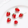 Close-up of glass strawberry beads with leaf detail and metal pins for DIY jewelry making - 3# Red Strawberry