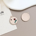 Detail of round enamel tulip pendants showing front floral art and back texture - Tulip Round Plate (10#)