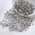 Macro detail of silver clover flower metal spacer beads for DIY jewelry making - Plum Blossom Style / 10 Pieces/Pack (5mm) / Silver