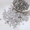 Close-up of heart-shaped silver spacer beads for DIY jewelry making on white background - Heart Style / 10 Pieces/Pack (5mm) / Silver