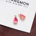 Detailed view of pink pear-cut cubic zirconia charms with gold plating for jewelry making - Style 9 (9#)