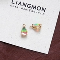 Macro shot of two teardrop pendants with gradient green-to-pink crystal and gold plating - Style 10 (10#)