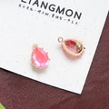 Macro detail of pear-shaped pink crystal pendants with gold-plated prong settings for DIY jewelry - Style 15 (15#)