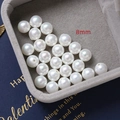 Close-up of 8mm white round pearls with high gloss and center holes for DIY jewelry - Style 1 / 1 Piece/Pack (8mm) / White