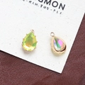 Teardrop crystal pendants in yellow-green and iridescent purple with gold-tone settings - Style 24 (24#)