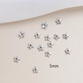 Detailed macro view of 5mm silver star-shaped metal beads for DIY jewelry making - Silver Pentagram Style (3#5mm)