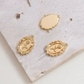 Macro detail of gold-plated rose flower pendant with vintage embossed relief texture - Gold Oval Rose (2#)