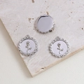 Macro detail of silver rose relief charms with wavy borders for DIY jewelry making - Silver Round Rose (6#)