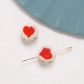 Detailed macro view of white ceramic heart beads showing pre-drilled holes for DIY jewelry - Heart Style (1#)