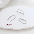 Macro shot of 925 sterling silver earring hooks measuring 2x9mm for DIY jewelry making - Minimalist Small (2x9) / White Gold