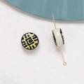 Close-up of vintage ceramic beads with black and yellow abstract patterns on white fabric - Ethnic Vortex Style (8#)