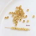 Vue macro de perles rainurées de 4mm plaquées or pour la création de bijoux - Or 18K (5#) / 4mm (Paquet de 50 Pièces) / Or