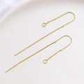 Macro detail of 14K gold plated U-shaped drop earrings with fine chains and small loops - 14k Gold Color