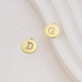 Detail of 18k gold plated letter D pendant with sparkling cubic zirconia inlay - Letter D / Gold