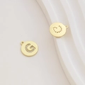 Detail of gold-plated letter G charm with pavé cubic zirconia for DIY jewelry - Letter G / Gold