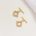Detail eines 14k vergoldeten OT-Knebels mit Zirkon-Kleeblatt und Hohlform - 18K Gold (Kleeblatt Strass)