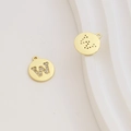Macro detail of gold-plated letter W charm with cubic zirconia for DIY jewelry making - Letter W / Gold
