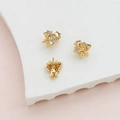Detailed view of gold-plated star charms with pavé cubic zirconia for DIY jewelry - K Gold