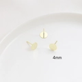 Macro detail of 4mm gold-plated earring studs for DIY jewelry with S925 silver pins - 4mm / 14K Gold