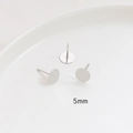 Detailed macro view of 5mm S925 silver flat round ear studs for DIY jewelry making - 5mm / White Gold