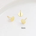 Detailed macro view of 6mm gold-plated S925 silver flat pad ear studs for jewelry DIY - 6mm / 18K Gold
