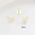 Macro shot of 8mm gold-plated flat stud earrings components with S925 silver pins - 8mm / 14K Gold