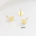 Macro detail of 8mm gold-plated flat base ear stud components with S925 silver needles - 8mm / 18K Gold