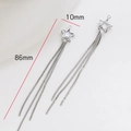 Détail de boucles d'oreilles étoile à franges, dimensions 10mm de large et 86mm de long - Étoile Couleur Argent
