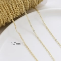 Macro detail of 1.7mm gold plated brass O-chain links for DIY jewelry making - 14K Gold Plated 1.7mm O-Chain