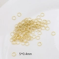 Detalle de anillas abiertas chapadas en oro de 5x0.4mm para bisutería artesanal DIY - Oro 14K 0,4x5mm