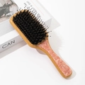Macro view of bamboo hairbrush with pink marble pattern and mixed boar bristles - Large / Pink Boar Bristle