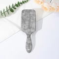 Detail view of the rectangular massage hairbrush with gray marble texture on white background - Pattern D (Gray Marble)