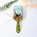 Detalle de cepillo para el pelo con estampado floral, gato y cerdas de masaje - Estilo Gato Blanco y Negro con Flores y Pájaros (D)