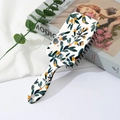 Detail of floral printed cushion hair brush with yellow citrus patterns and hanging hole - Fresh Green Leaves and Citrus Fruit Pattern (B)