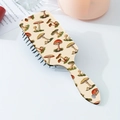 Detailed view of hedgehog mushroom print hairbrush with vintage cushion bristles - Colorful Mushroom Style (B)