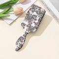 Rectangular paddle brush with black butterfly and pink floral print on a beige background - Air Cushion Brush (QNS3014) / Double-Sided Butterfly Print
