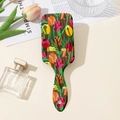Detail of floral air cushion hairbrush with vintage tulip print on a styled vanity table - Tulip Pattern (B)