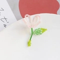 Detailed view of handmade beaded flower pendant with pink petals and green leaf accents - Pink Single Flower