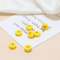 Detail of yellow flower ceramic beads with black smiley faces for DIY jewelry making - Yellow Smiley Face Small Flower