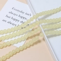 Close-up of 8mm cream-yellow jelly glass beads with smooth luster for DIY jewelry - Single Piece / 4# Beige