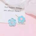 Detail of five-petal acrylic flower beads in blue and pink with side holes for DIY jewelry - Mint Green Flower