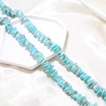 Detailed close-up of light blue irregular natural crystal beads for DIY jewelry making - 1 Piece / Mint Green
