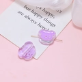 Macro detail of a purple translucent acrylic bear bead with a gold pin component - Purple Bear
