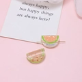 Macro detail of acrylic watermelon bead with horizontal hole for DIY jewelry making - Light Orange Watermelon