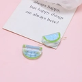 Macro detail of acrylic watermelon charms with holes for DIY jewelry making kits - Blue Watermelon