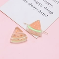 Macro detail of translucent acrylic watermelon charms for DIY jewelry making and earrings - Pink Green Watermelon