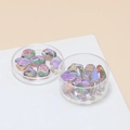 Close-up of iridescent aurora glass beads in clear plastic cases for DIY jewelry crafting - 10 Pieces Pack / Purple Dazzling